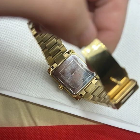 Michael Kors Emery Three-Hand Gold-Tone Stainless Steel Watch - Picture 2 of 4